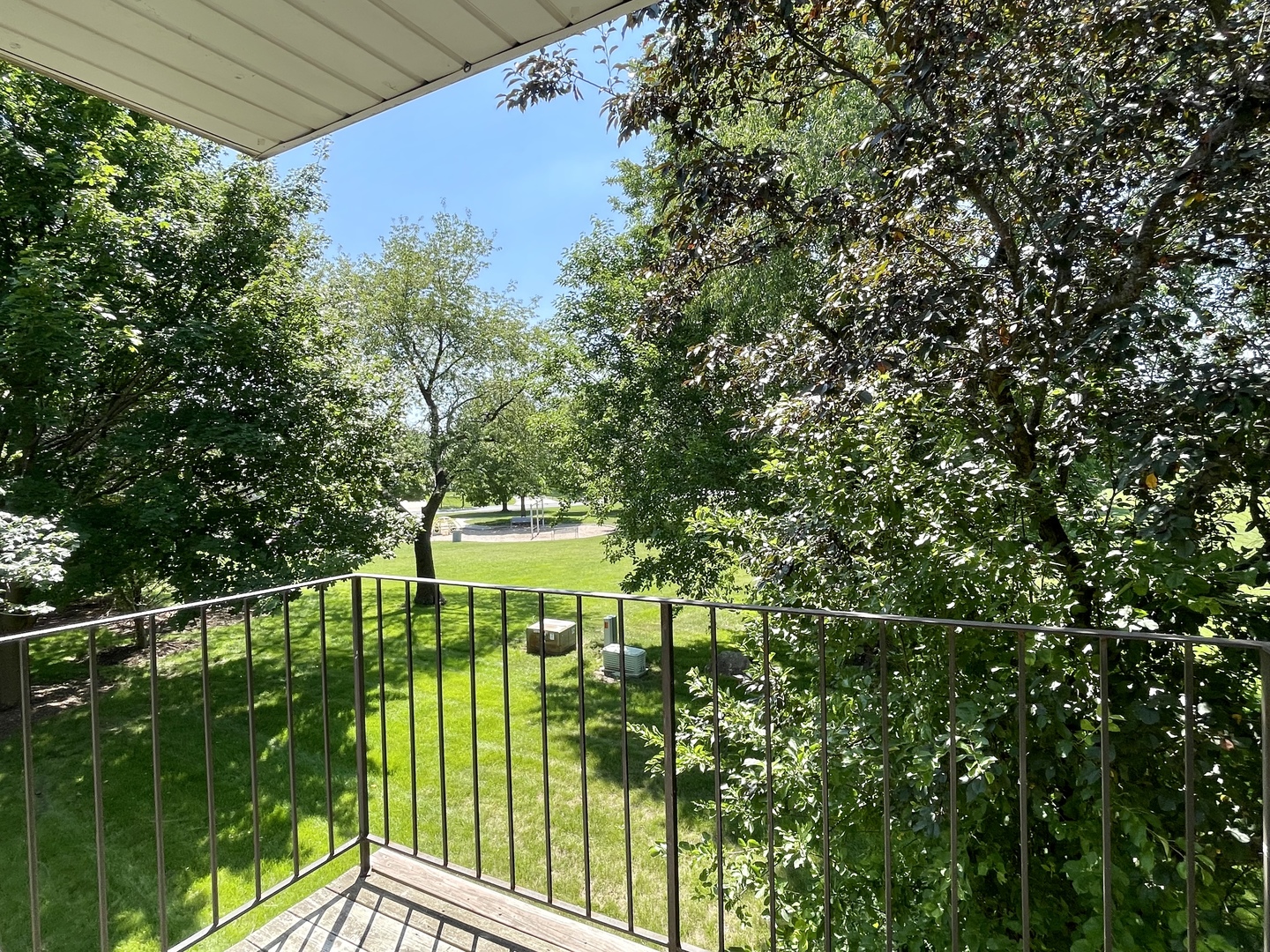 20 Gant Circle, Unit E Streamwood, IL 60107 - Photo 10 of 21 a view of a balcony with a garden