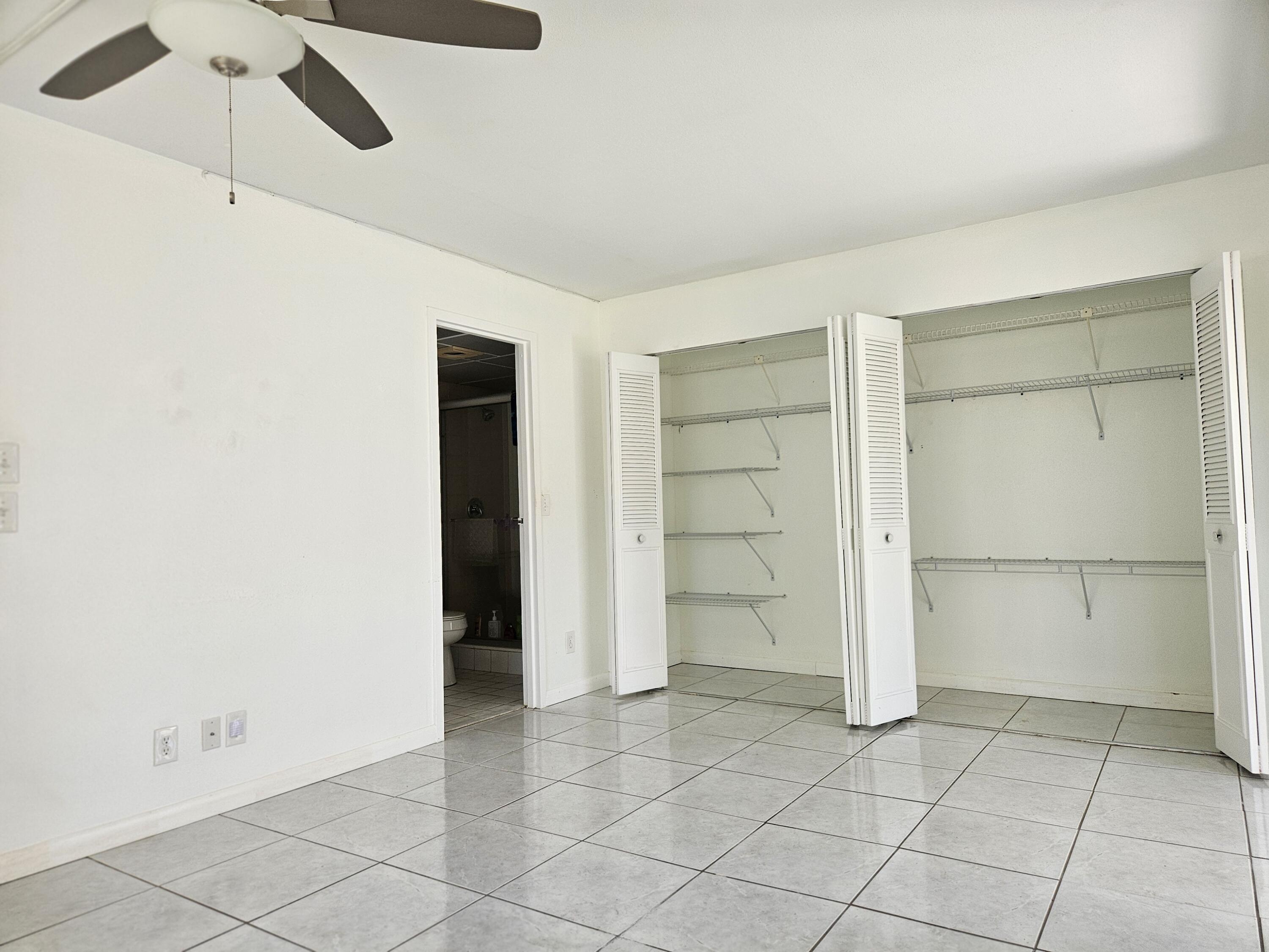 743 Flanders P Delray Beach, FL 33484 - Photo 9 of 15 Bedroom and closet