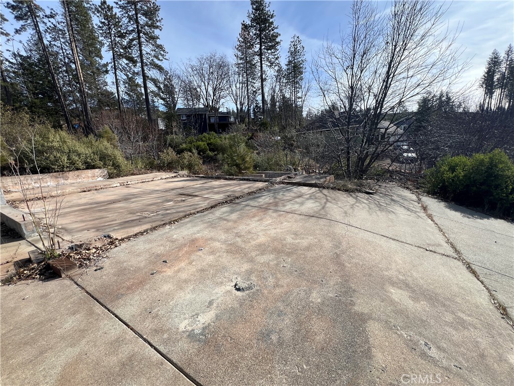 16090 Maple Street Cobb, CA 95426 - Photo 2 of 8 a view of a yard with trees