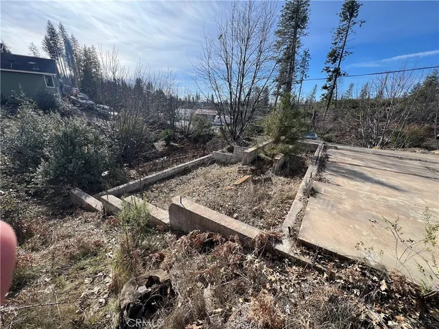 a view of a yard with an outdoor space