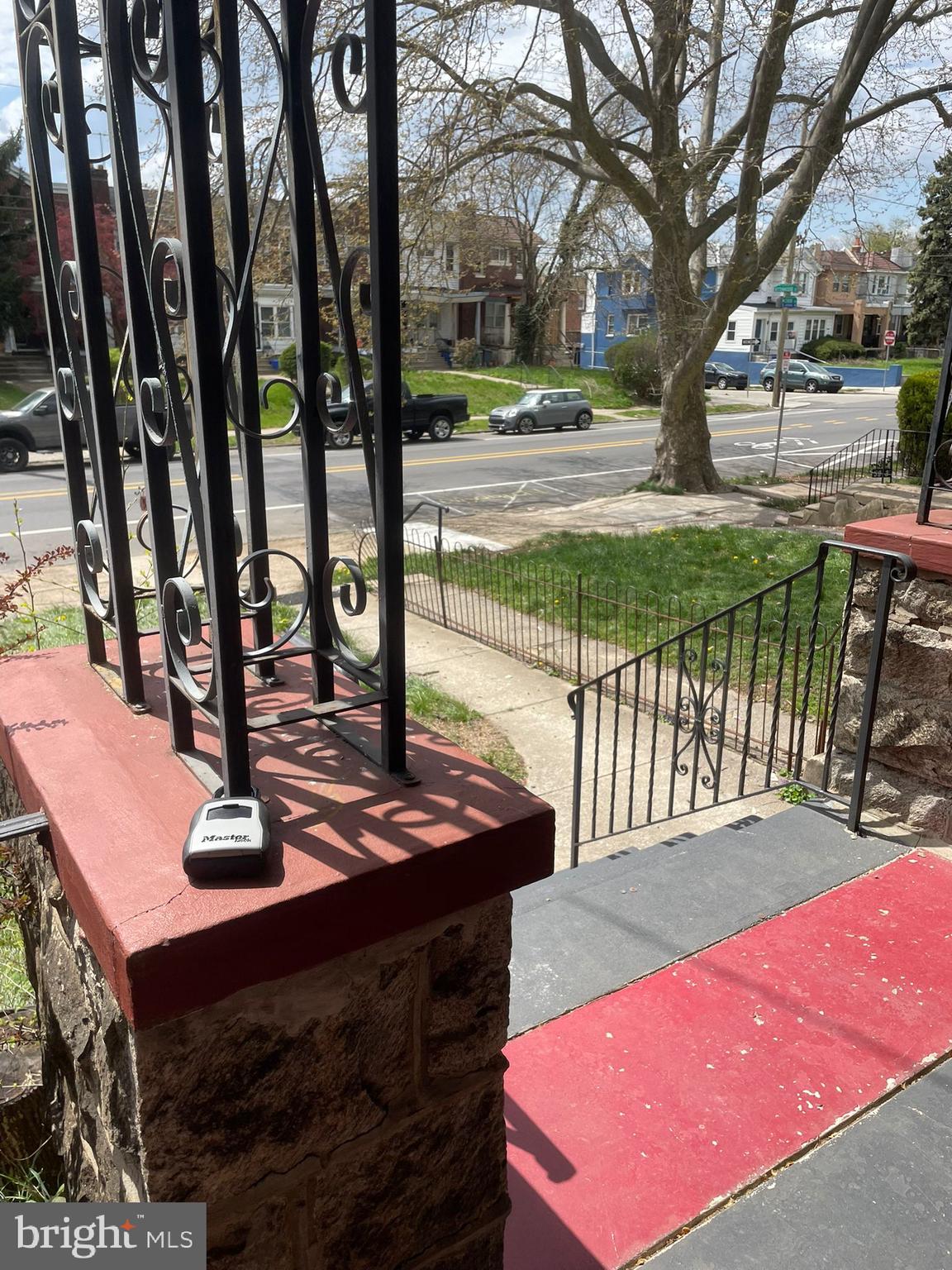 5809 Chew Avenue Philadelphia, PA 19138 - Photo 29 of 29 a view of a patio with a table chairs and a fire pit