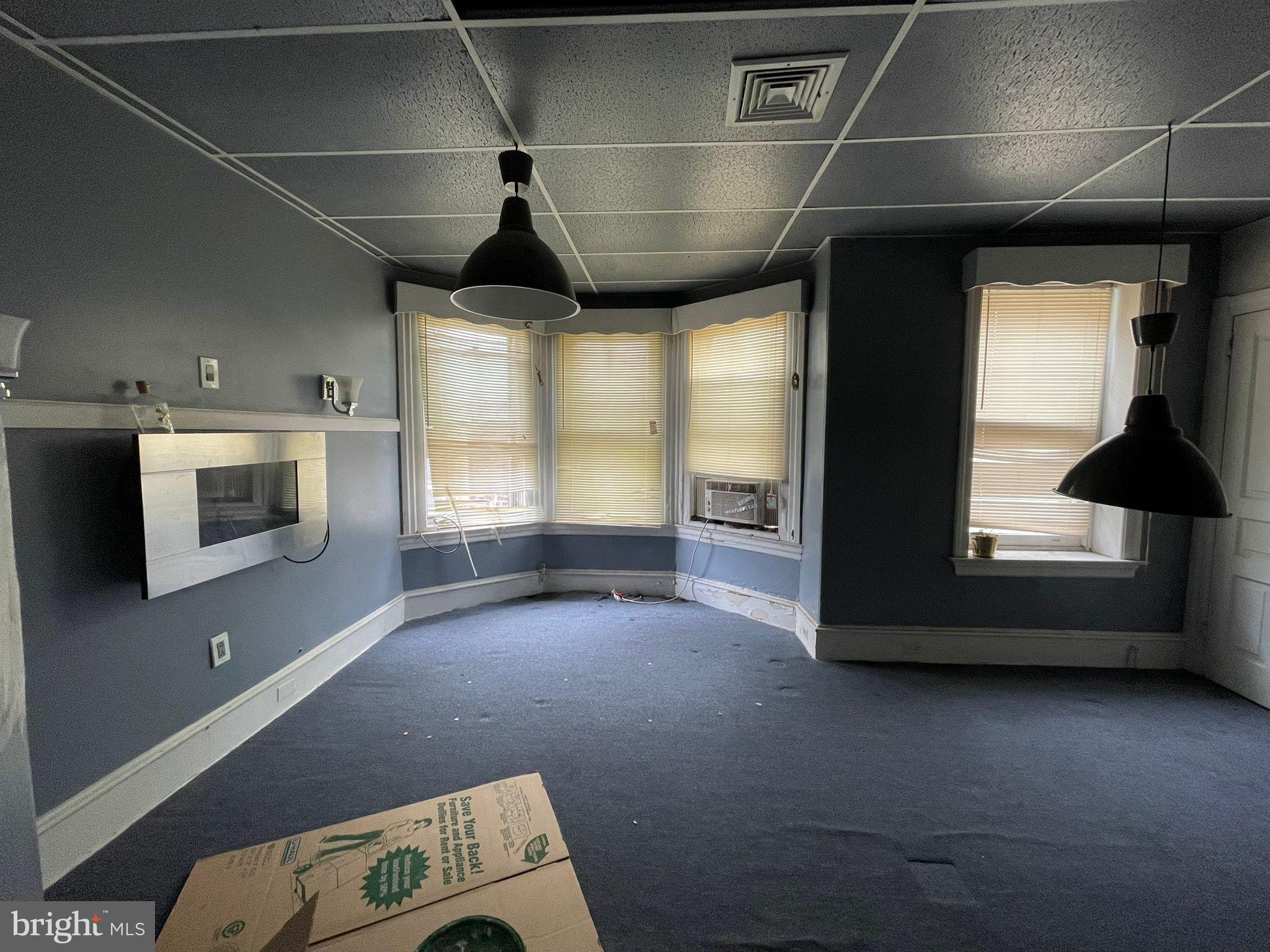 5809 Chew Avenue Philadelphia, PA 19138 - Photo 3 of 29 a living room with furniture and a window