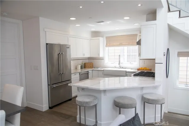 a kitchen with a sink and a window