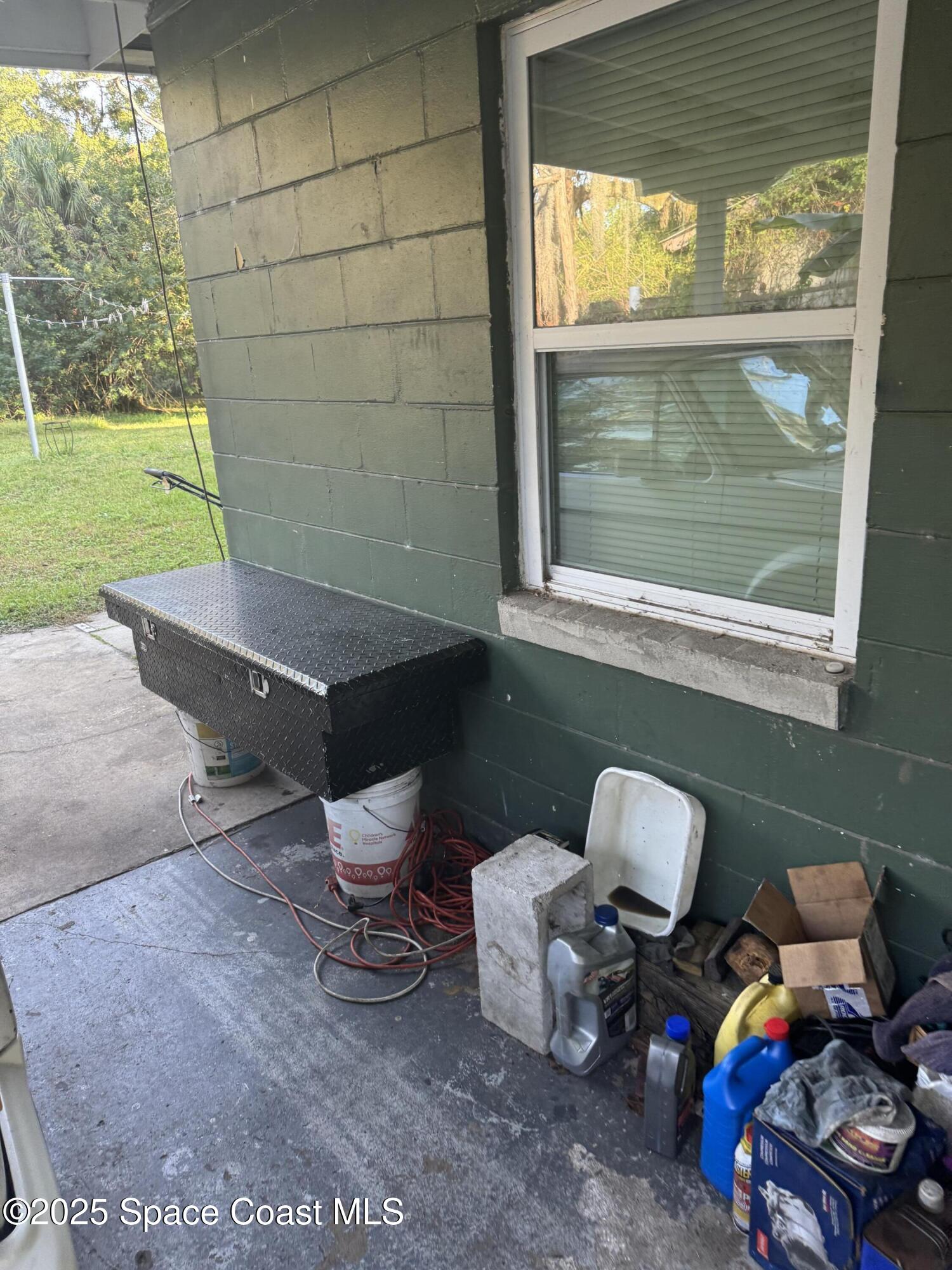 358 Palm Avenue Cocoa, FL 32922 - Photo 3 of 4 a living room with furniture and a window