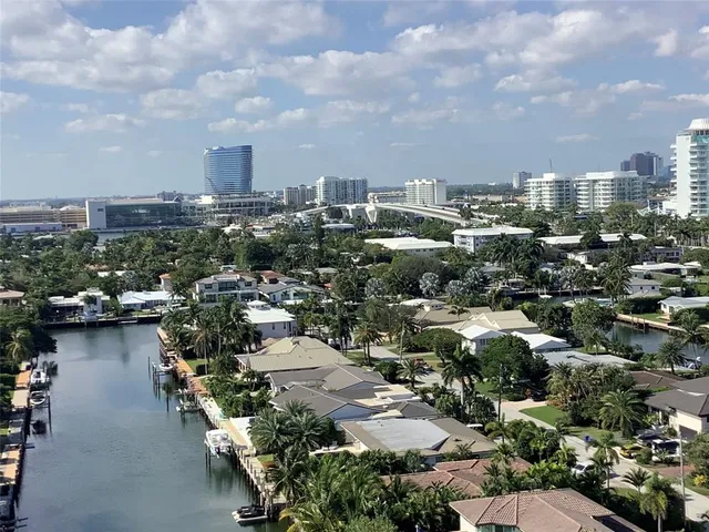 a view of a building and car parked