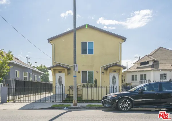 a car parked in front of a house