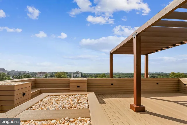 a balcony with wooden floor