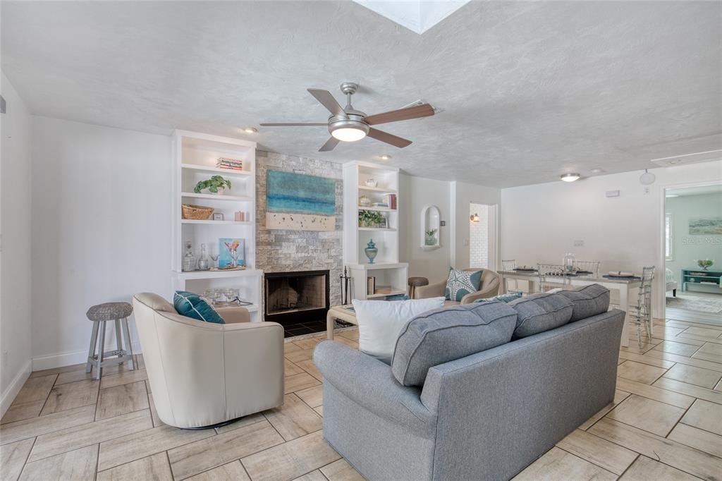 1127 Indigo Road Ormond Beach, FL 32174 - Photo 13 of 94 a living room with furniture and a fireplace