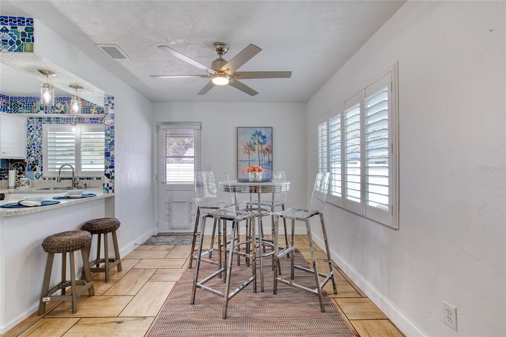 1127 Indigo Road Ormond Beach, FL 32174 - Photo 14 of 94 a view of a livingroom with furniture window and wooden floor