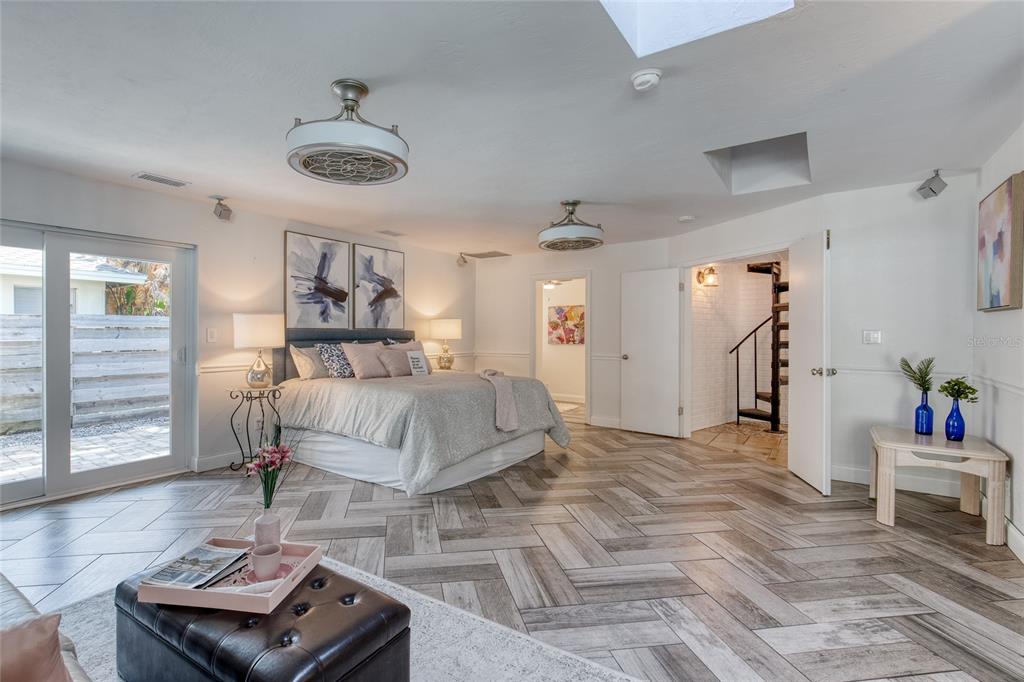 1127 Indigo Road Ormond Beach, FL 32174 - Photo 28 of 94 a bedroom with a bed and window