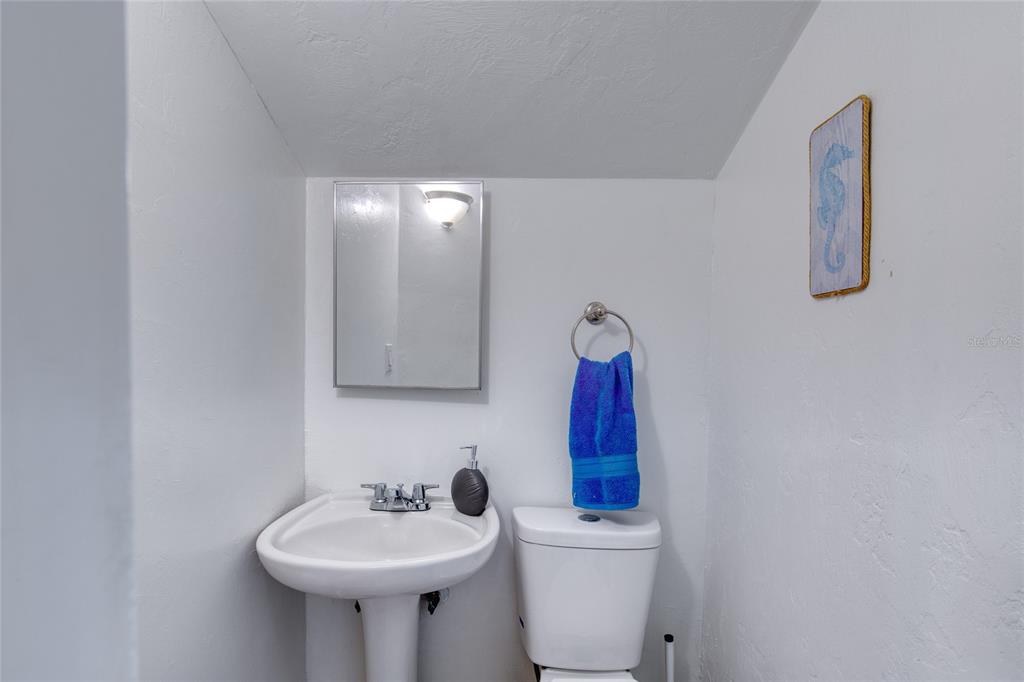 1127 Indigo Road Ormond Beach, FL 32174 - Photo 55 of 94 a bathroom with a sink and a toilet