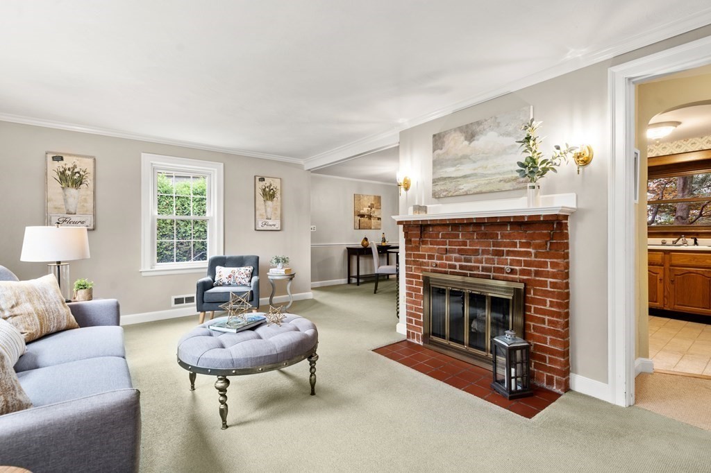 6 Stowecroft Road Arlington, MA 02474 - Photo 5 of 17 a living room with furniture and a fireplace
