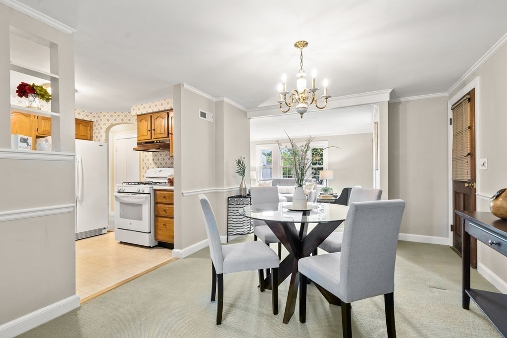 6 Stowecroft Road Arlington, MA 02474 - Photo 7 of 17 a view of a dining room with furniture and window