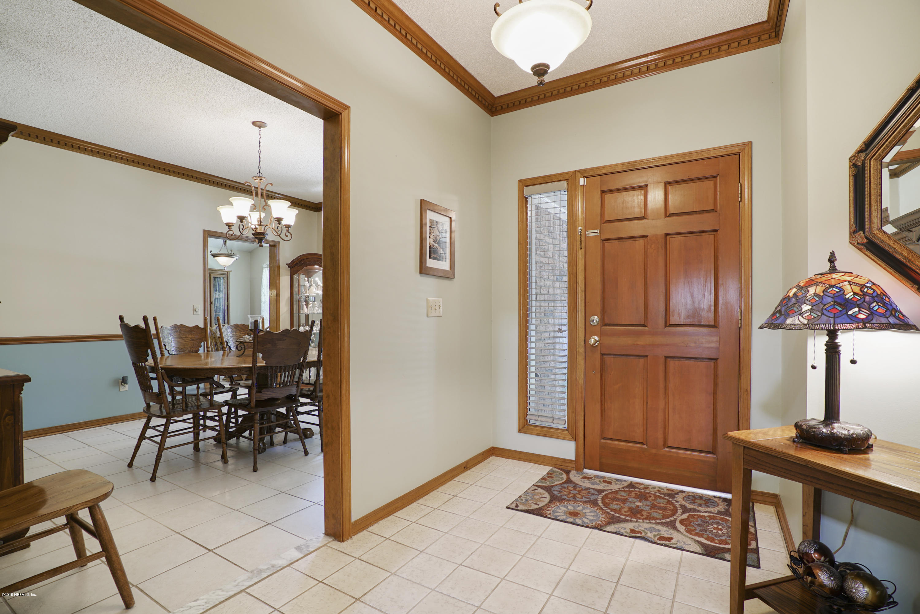 3165 Nautilus Road Middleburg, FL 32068 - Photo 5 of 35 a view of a livingroom with furniture and window