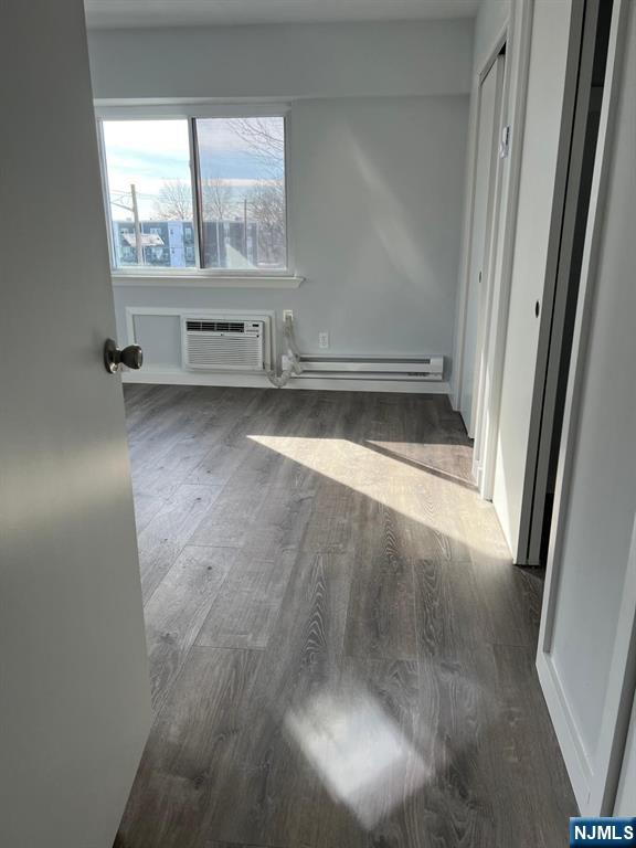 47 Polifly Road, Unit 1A Hackensack, NJ 07601 - Photo 11 of 19 a view of an empty room with a window