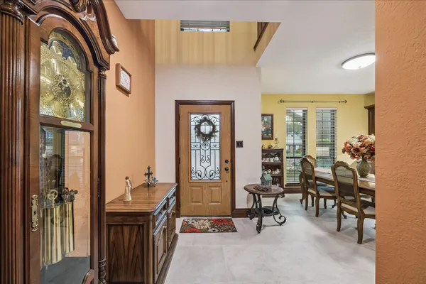 a view of a livingroom with furniture and windows