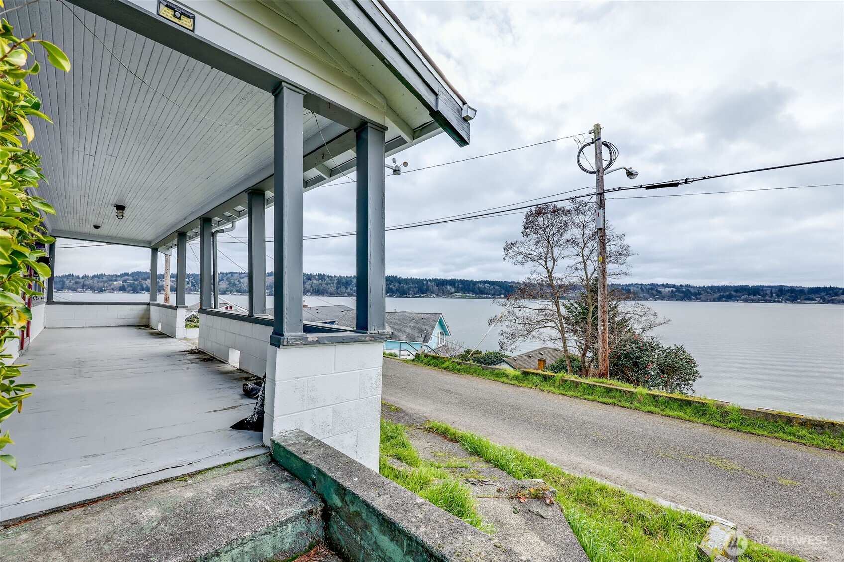 514 Shore Drive Bremerton, WA 98310 - Photo 2 of 40 a roof deck with couch and chairs