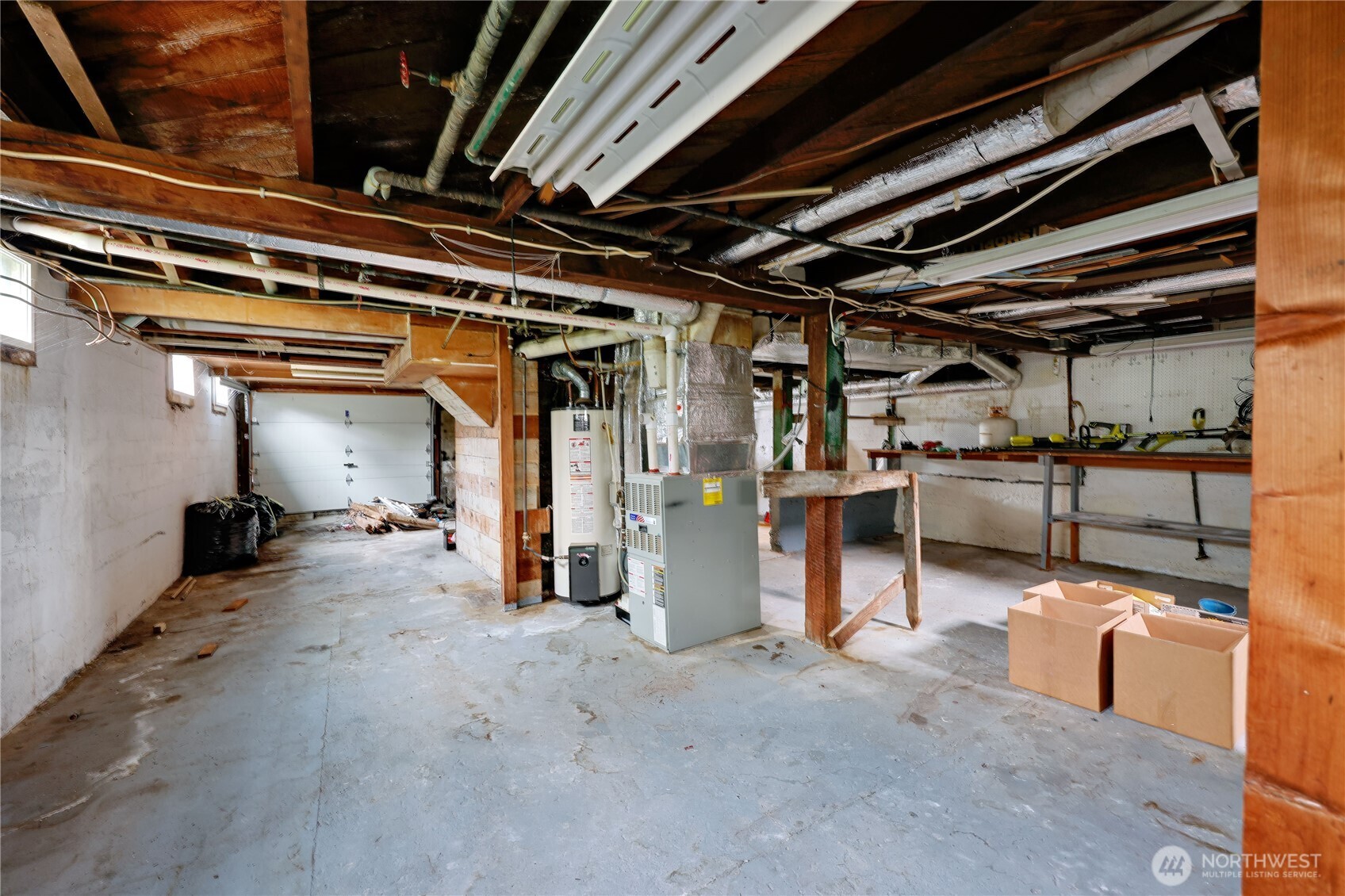 514 Shore Drive Bremerton, WA 98310 - Photo 31 of 40 a view of an empty room with storage