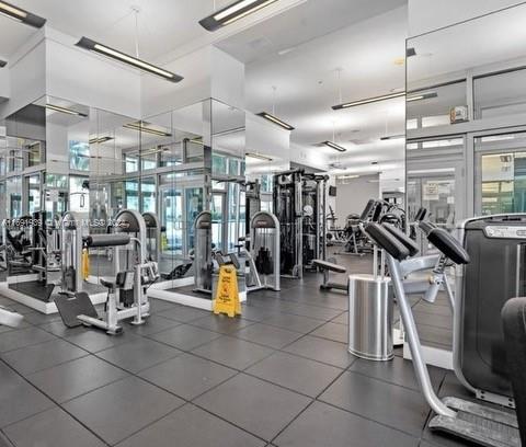 90 Southwest 3rd Street, Unit PH15 Miami, FL 33130 - Photo 3 of 18 a view of a room with gym equipment