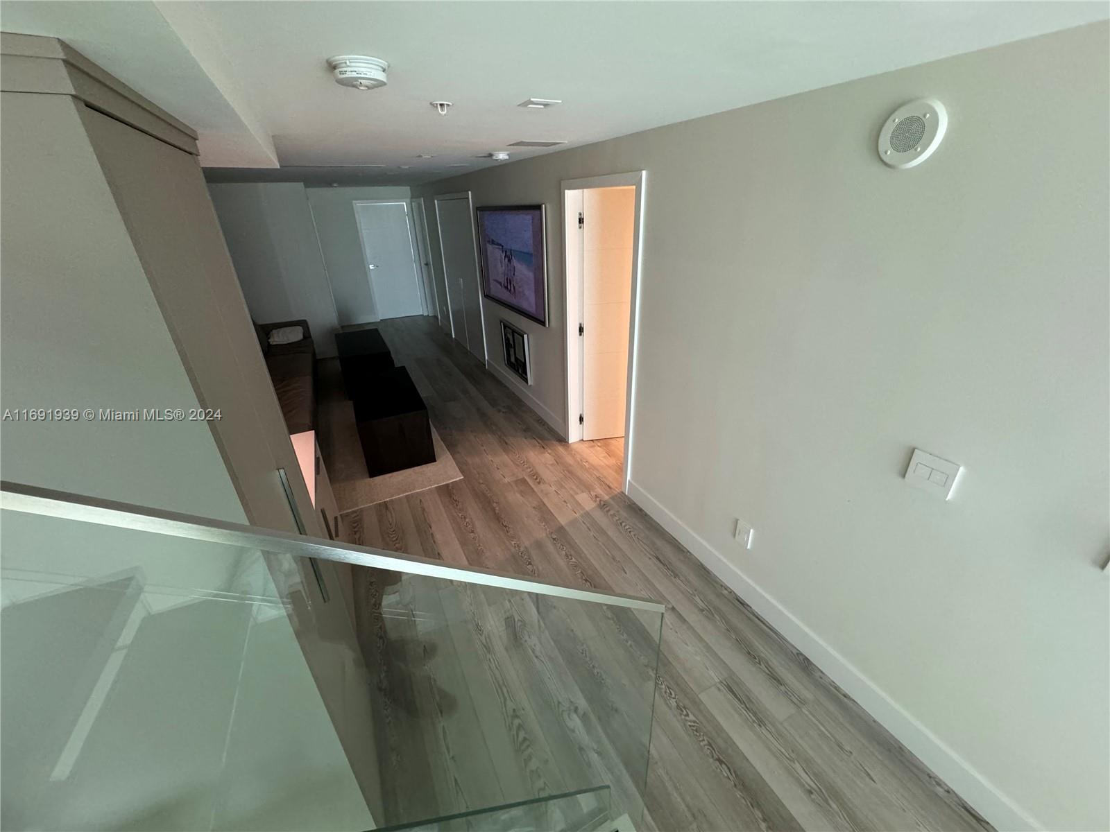 90 Southwest 3rd Street, Unit PH15 Miami, FL 33130 - Photo 6 of 18 a view of a kitchen