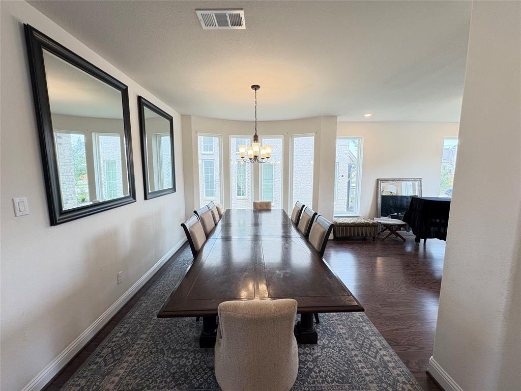 323 Butternut Way Irving, TX 75063 - Photo 10 of 32 a lobby with furniture and a chandelier