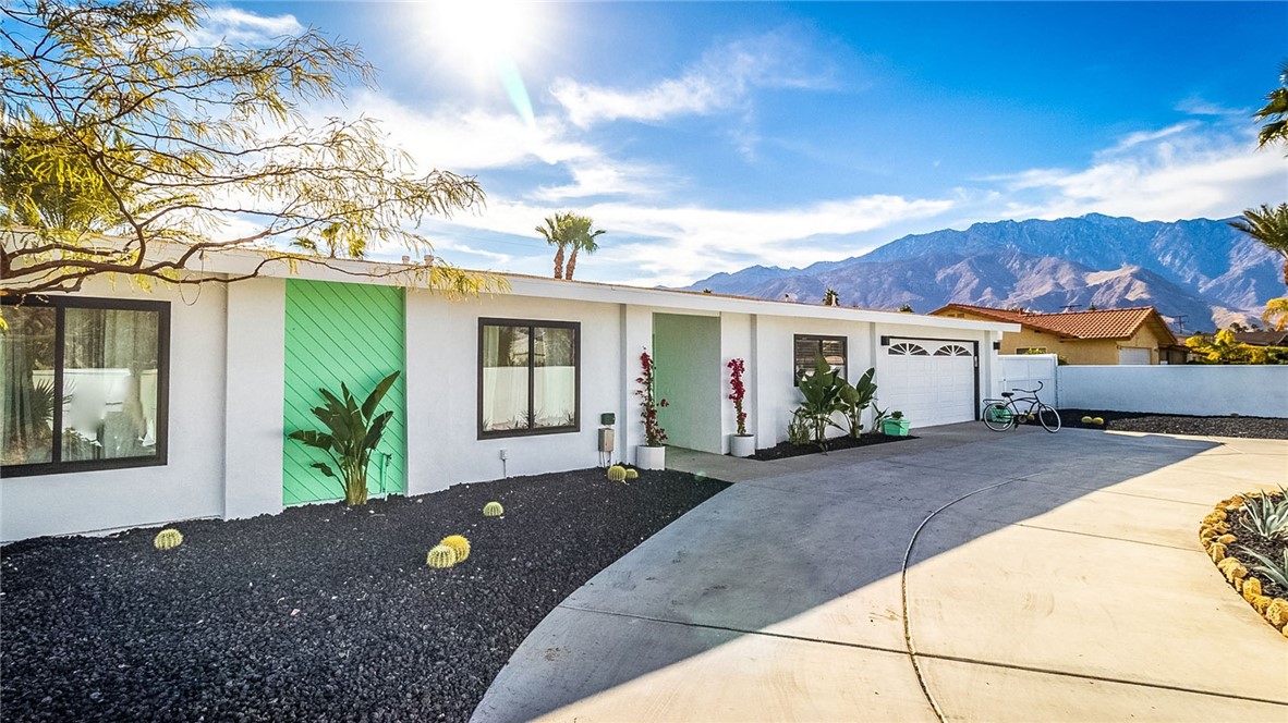 2825 East Verona Road Palm Springs, CA 92262 - Photo 1 of 1 a front view of a house with a yard