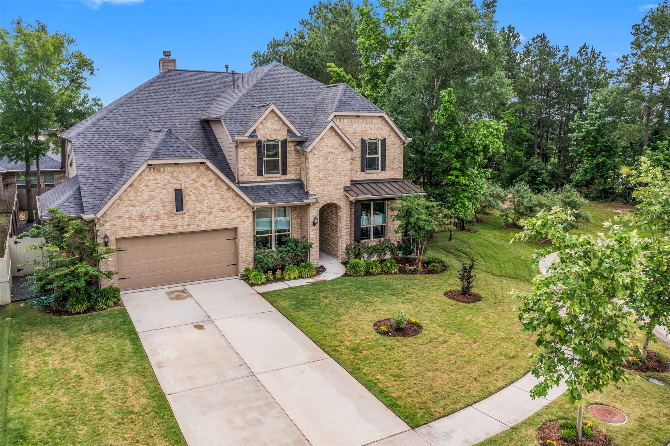 1053 Bat Hawk Court Conroe, TX 77385 - Photo 2 of 50 a view of backyard of the house