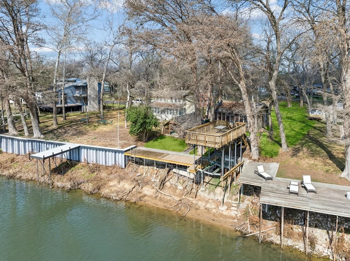 1307 Terminal Loop Road McQueeney, TX 78123 - Photo 2 of 23 a view of a lake with patio