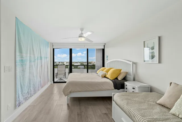 a bedroom with bed and window