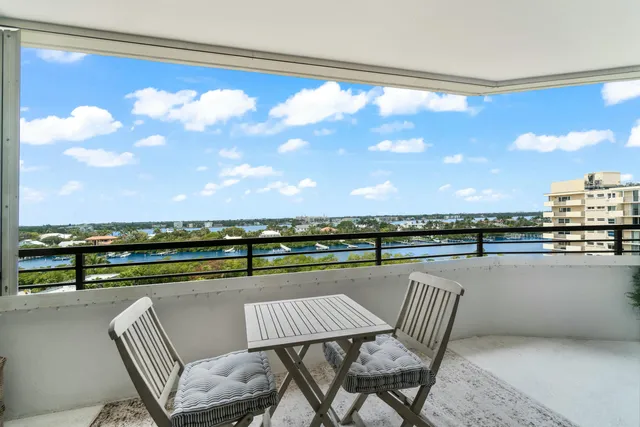 a view of swimming pool with outdoor seating