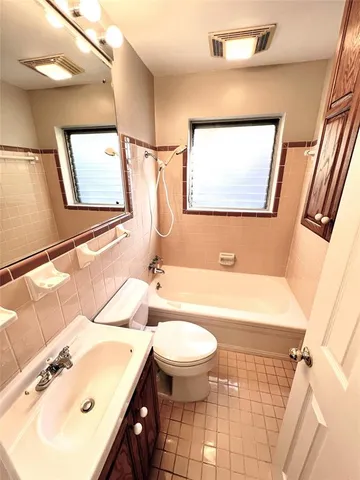 a view of gallery with wooden floor