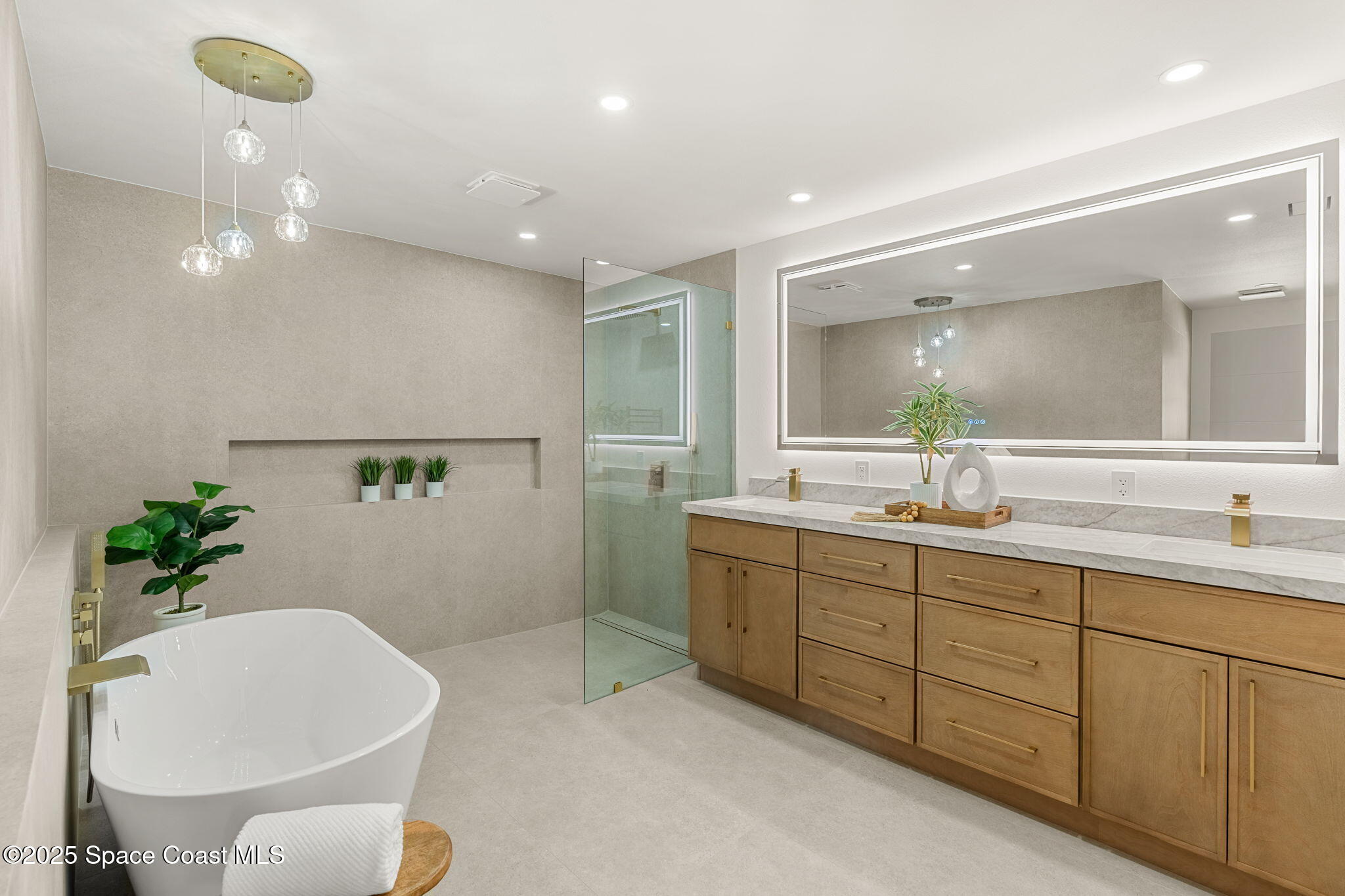 4313 Country Road Melbourne, FL 32934 - Photo 25 of 58 a bathroom with a double vanity sink and a mirror