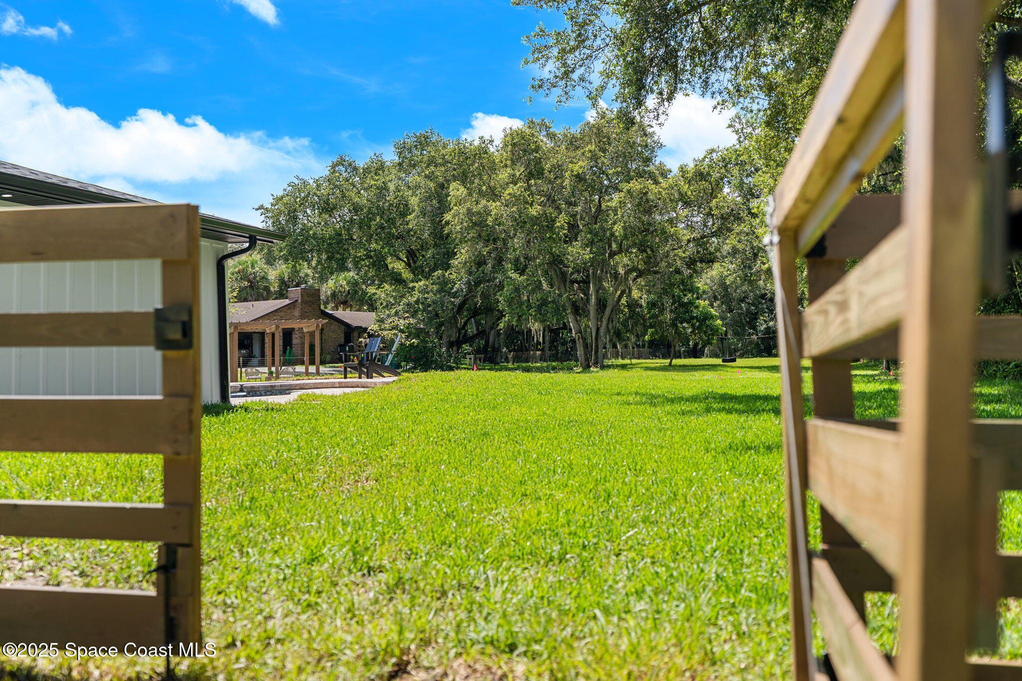 4313 Country Road Melbourne, FL 32934 - Photo 42 of 58 Wide gates and big spaces
