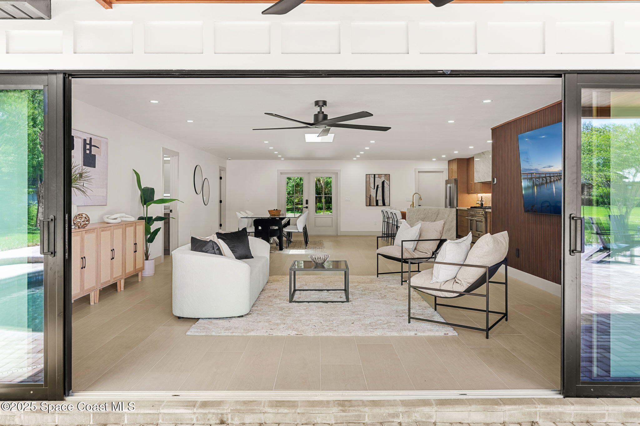 4313 Country Road Melbourne, FL 32934 - Photo 5 of 58 Impact rated glass throughout