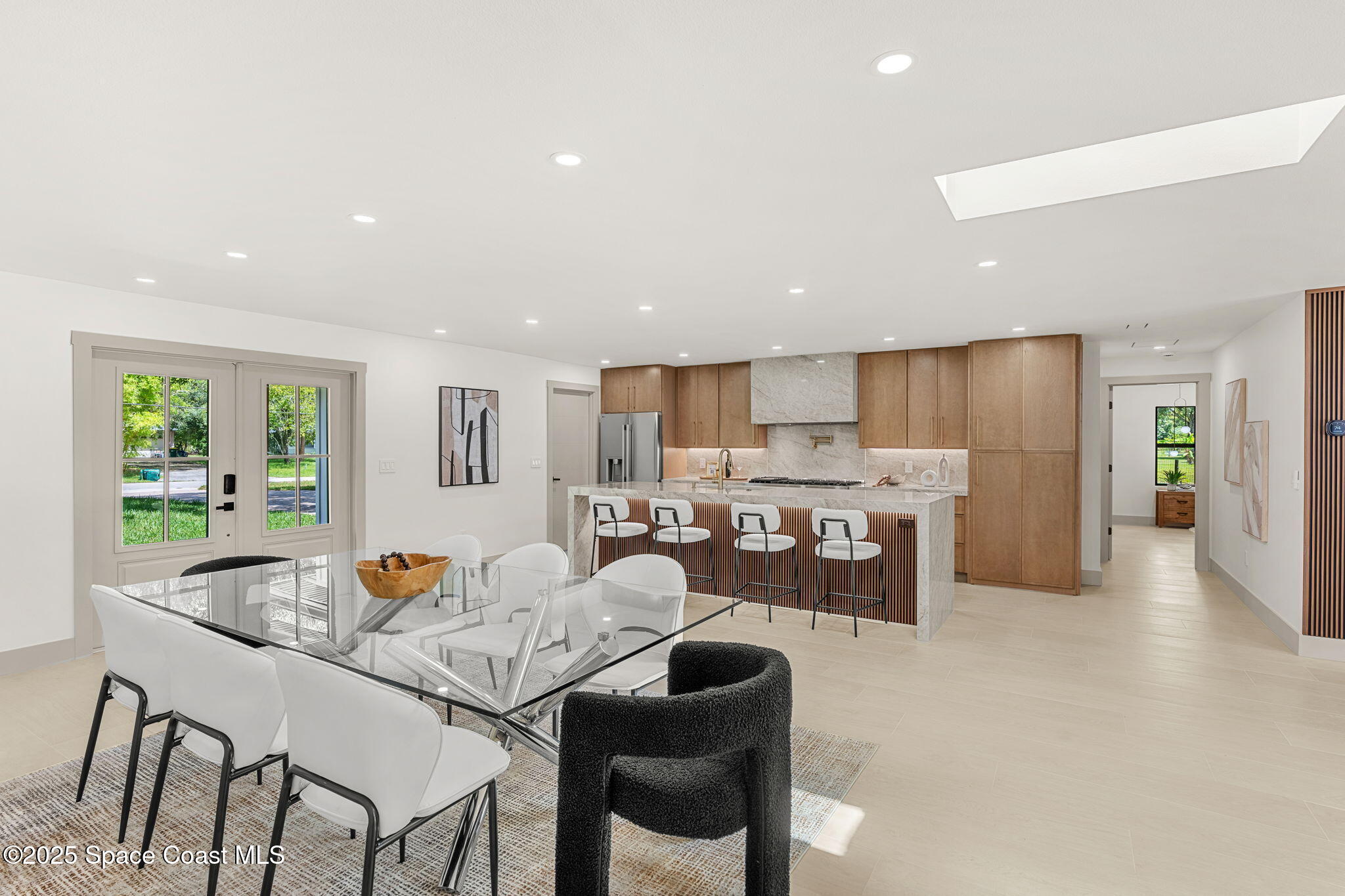 4313 Country Road Melbourne, FL 32934 - Photo 9 of 58 a living room with stainless steel appliances furniture a dining table and kitchen view