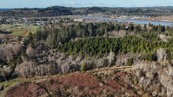 a view of a lake with green space