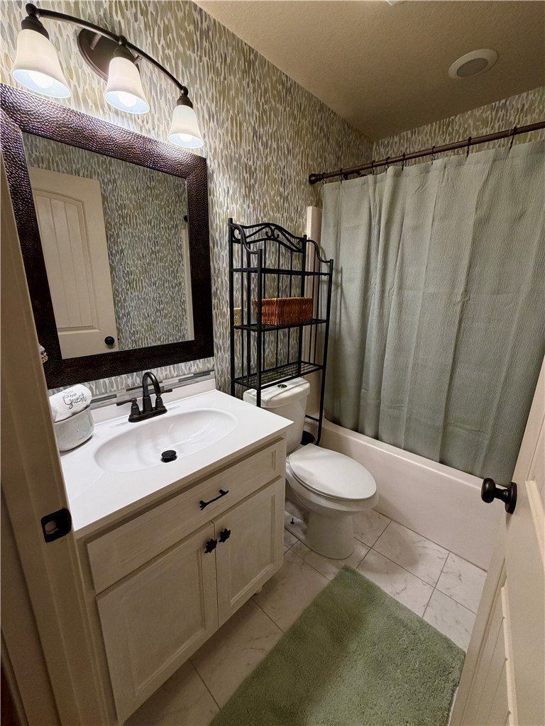 232 Hunters Trail Walhalla, SC 29691 - Photo 22 of 38 This bathroom features a contemporary vanity and a spacious bathtub, creating a refreshing daily retreat.