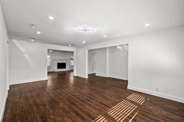 a view of livingroom with hardwood floor and a ceiling fan