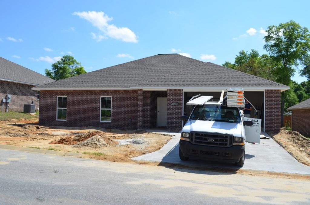 4604 Hermosa Road Crestview, FL 32539 - Photo 1 of 12 a house view with a sitting space and garden