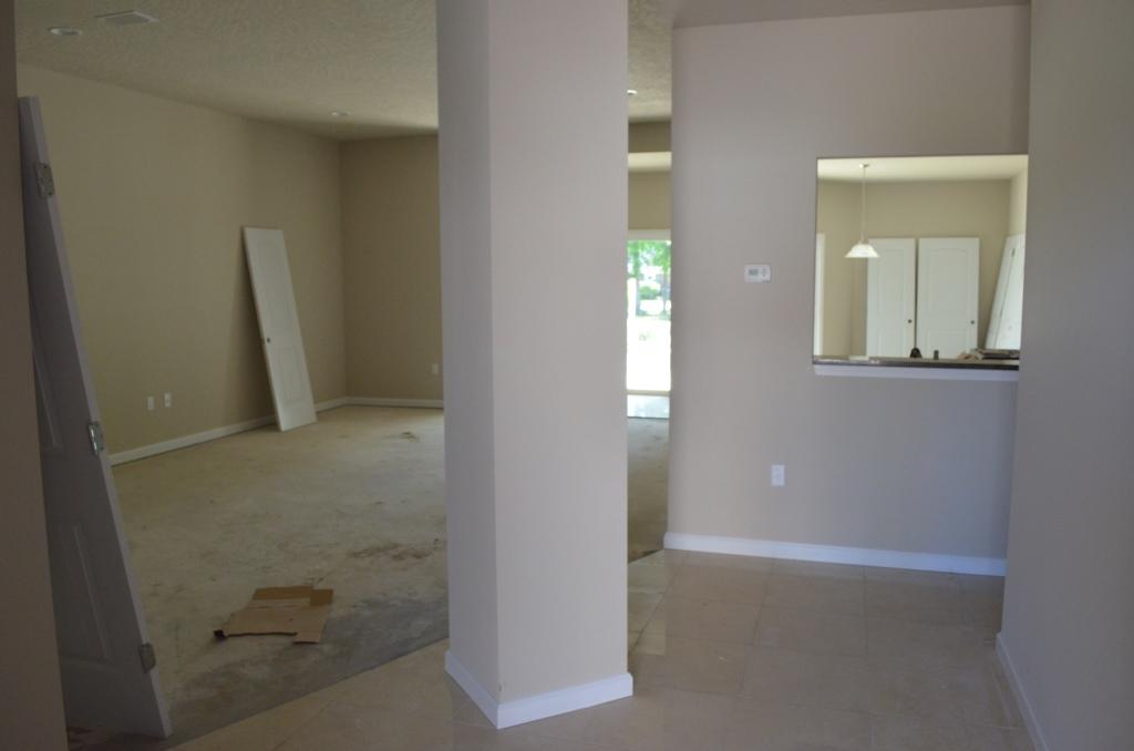 4604 Hermosa Road Crestview, FL 32539 - Photo 4 of 12 an empty room with windows