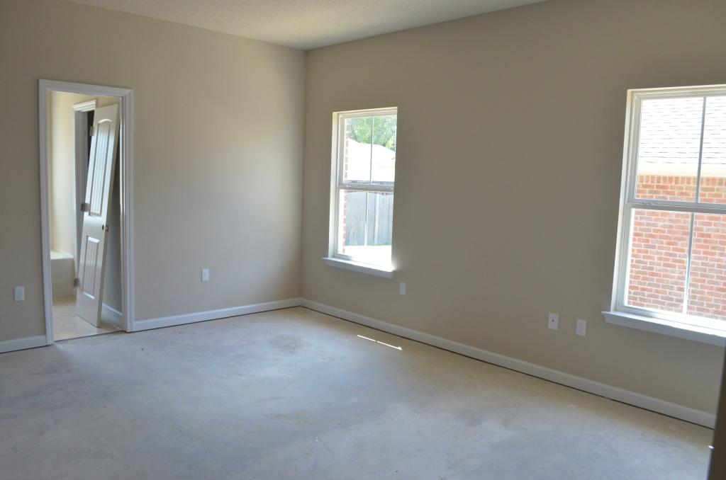 4604 Hermosa Road Crestview, FL 32539 - Photo 8 of 12 an empty room with windows and closet