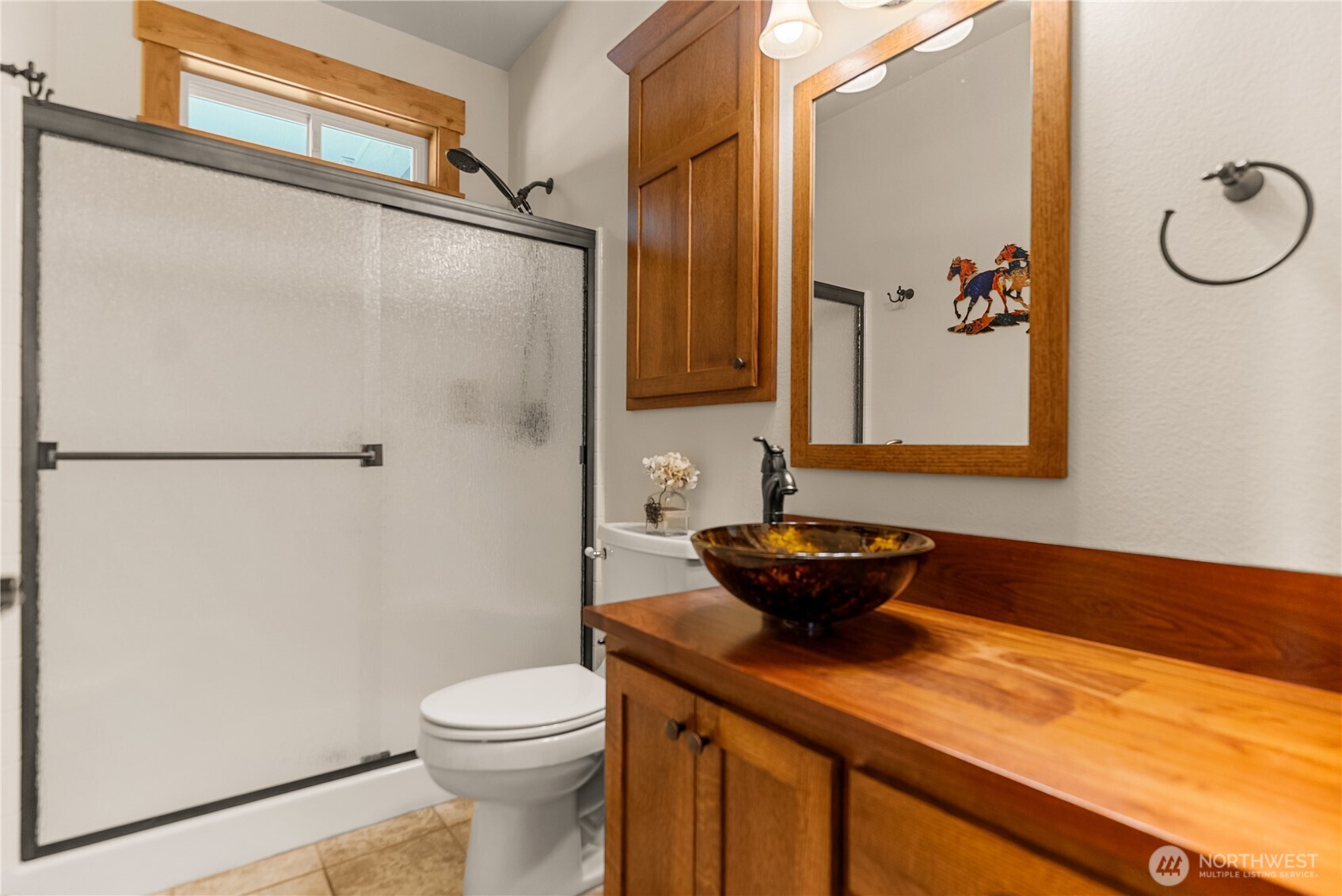 23 George Road Omak, WA 98841 - Photo 23 of 40 a bathroom with a sink and a toilet