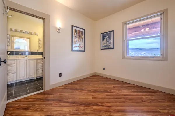 a view of a room with lots of furniture