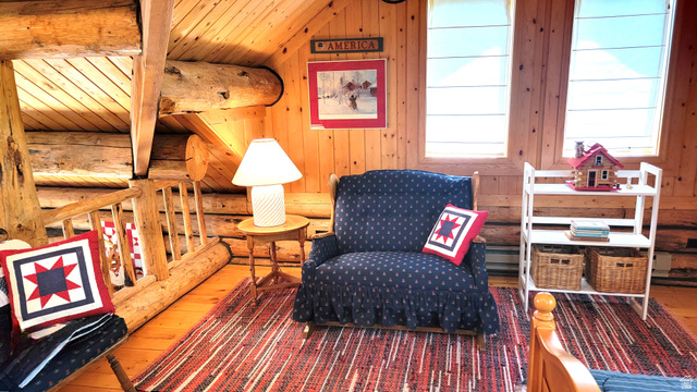 6210 Mountain View Road, Unit 133 Coalville, UT 84017 - Photo 51 of 87 Sitting area of the loft with a rocking love seat. Perfect for bedtime stories and lullabies.