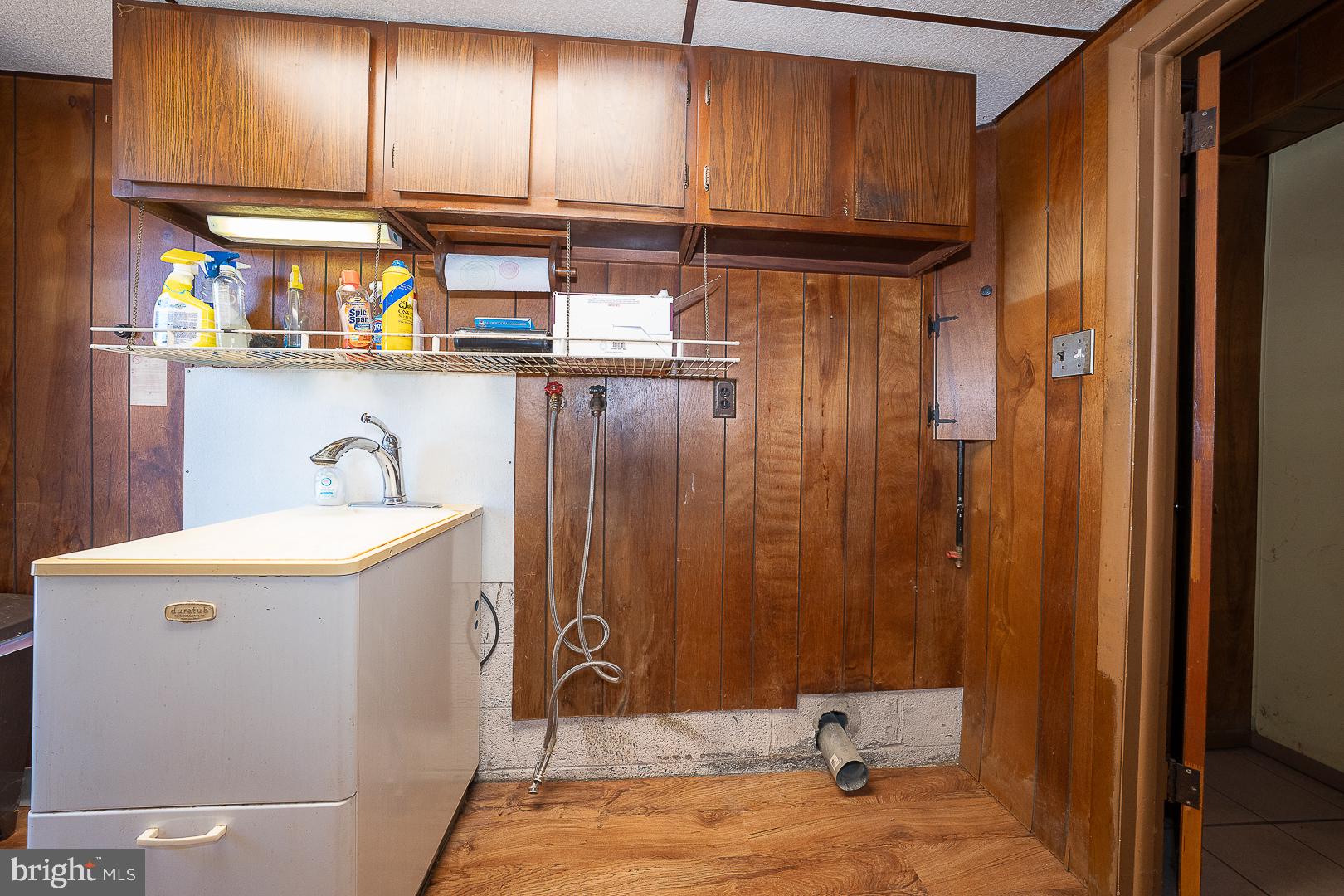 437 Rittenhouse Circle Havertown, PA 19083 - Photo 40 of 55 Functional laundry space with wood accents.