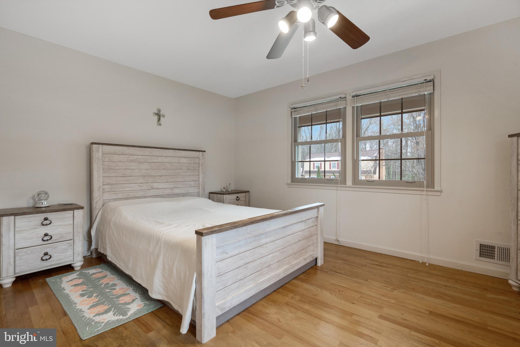 8702 Gateshead Road Alexandria, VA 22309 - Photo 12 of 42 a bedroom with a bed and window