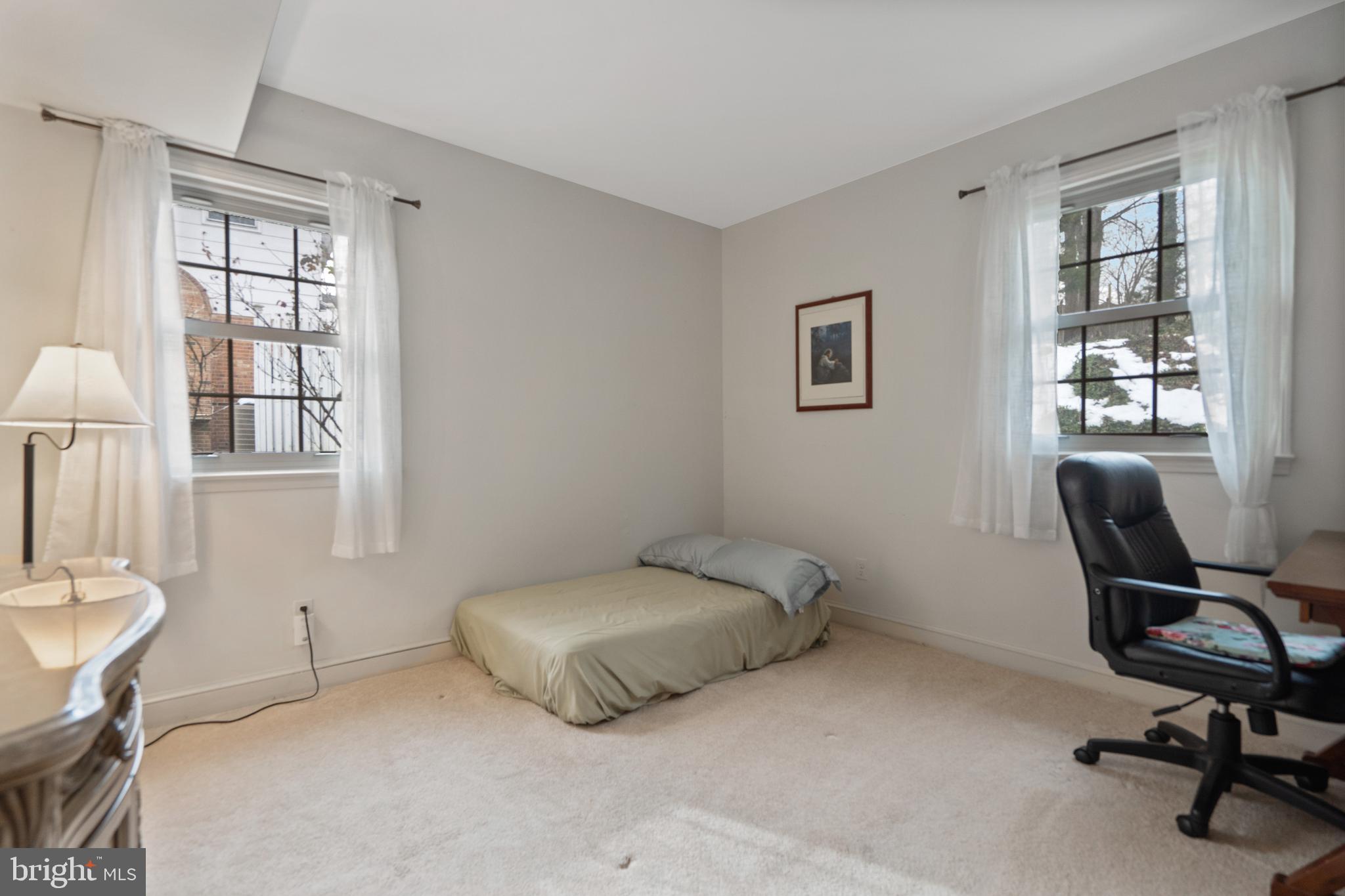 8702 Gateshead Road Alexandria, VA 22309 - Photo 23 of 42 a bedroom with a bed and a window