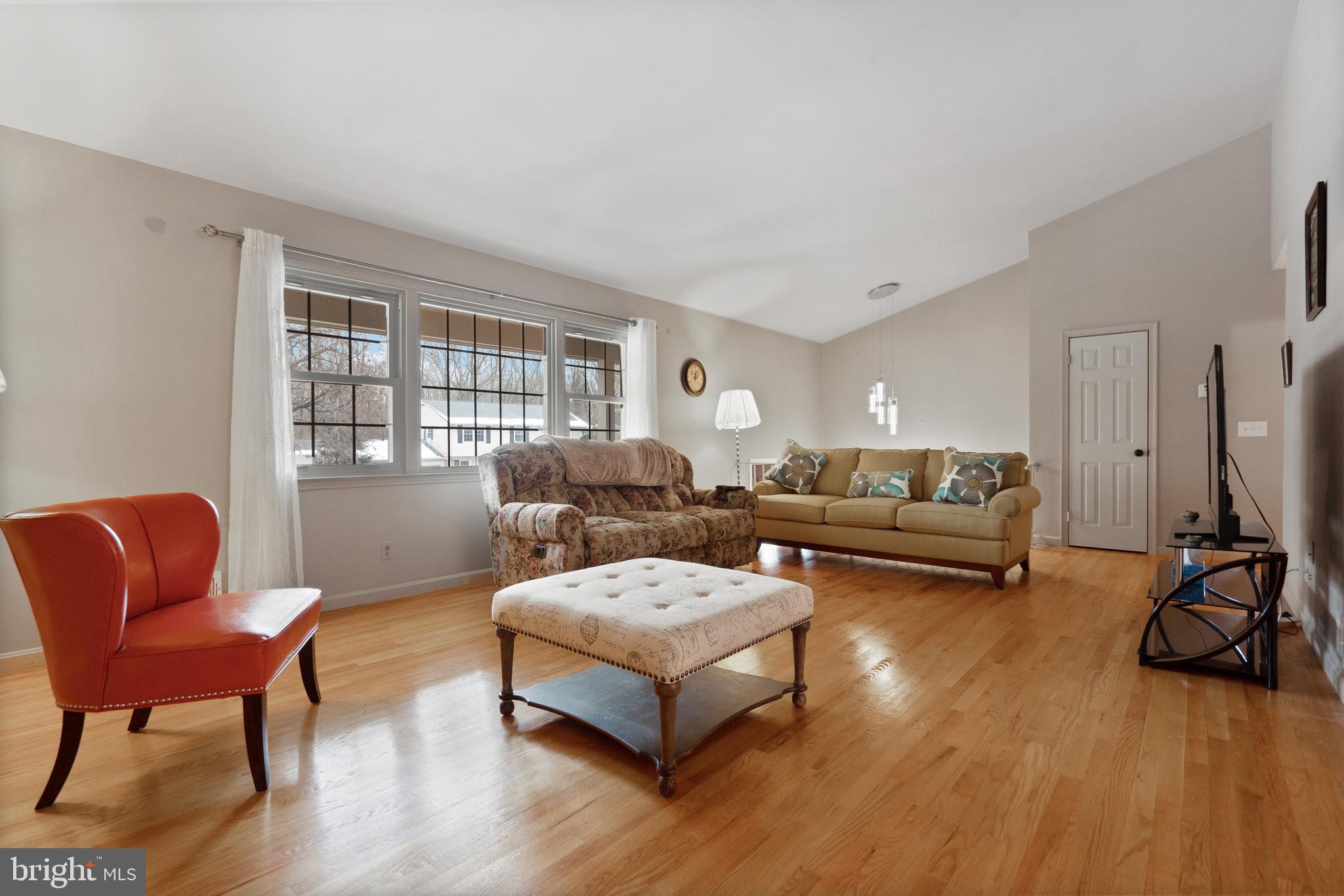 8702 Gateshead Road Alexandria, VA 22309 - Photo 5 of 42 a living room with furniture and a table
