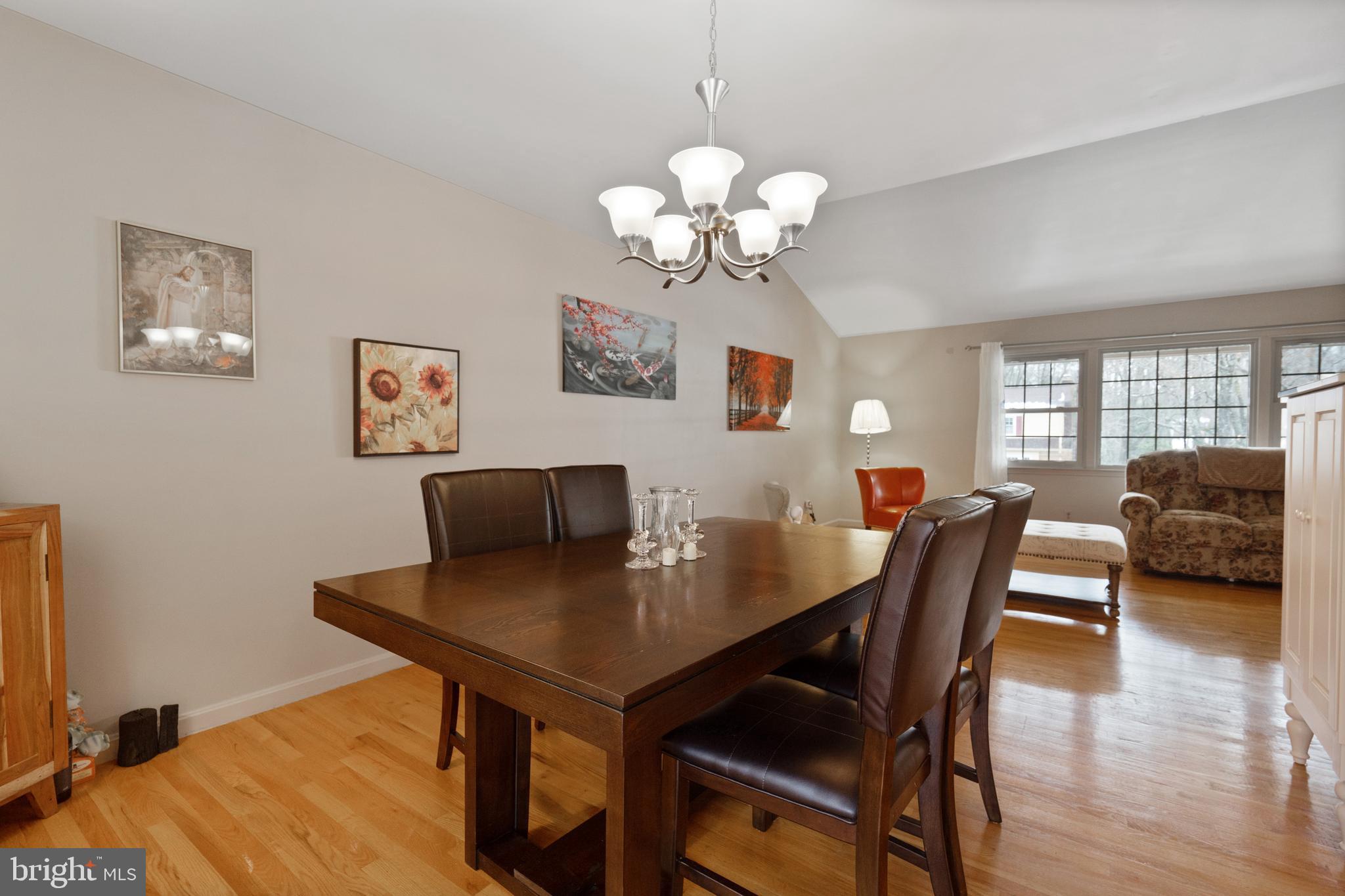 8702 Gateshead Road Alexandria, VA 22309 - Photo 8 of 42 a view of a dining room with furniture and wooden floor