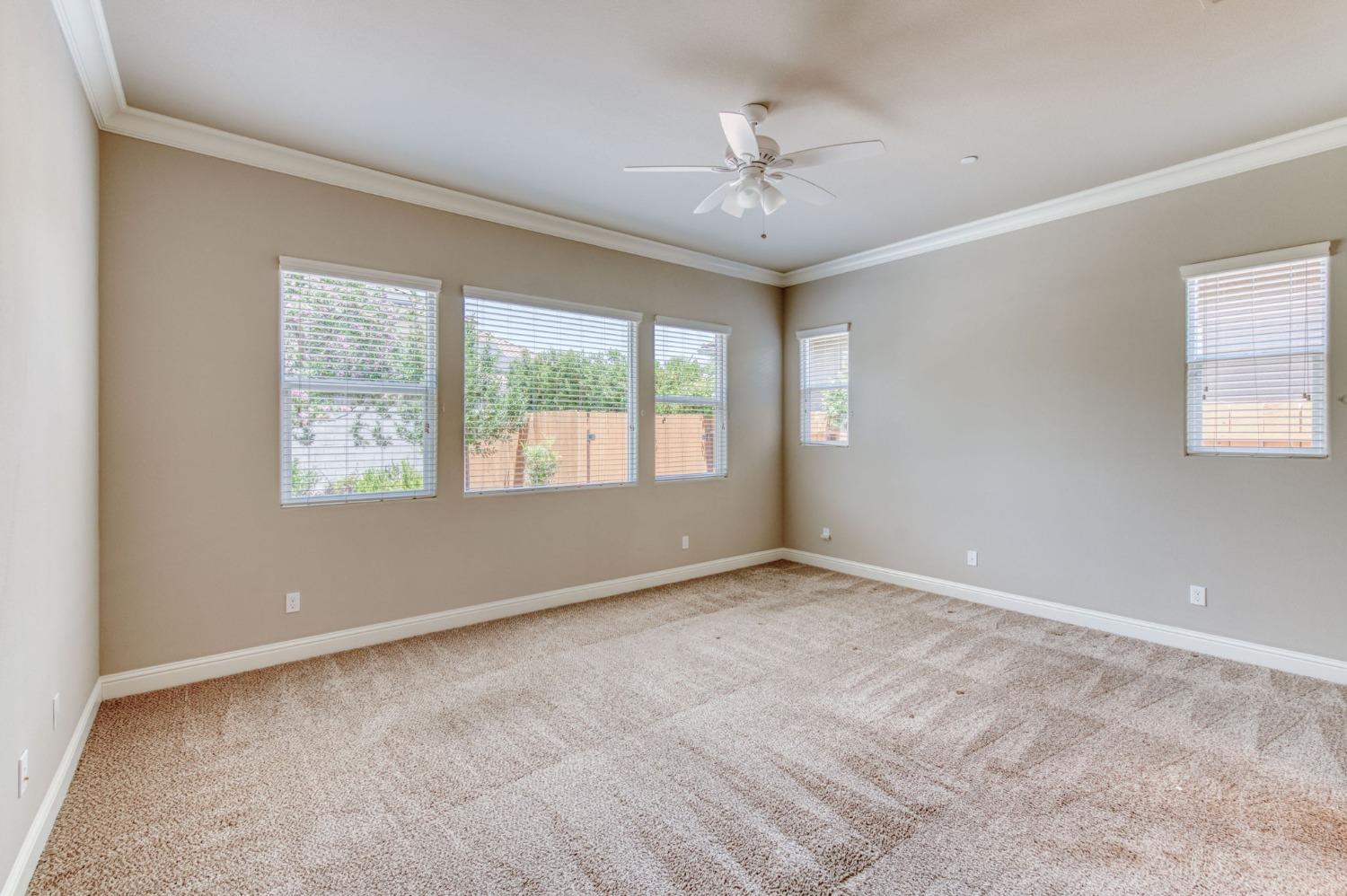 3301 Salem Avenue Clovis, CA 93619 - Photo 27 of 41 a view of an empty room with a window